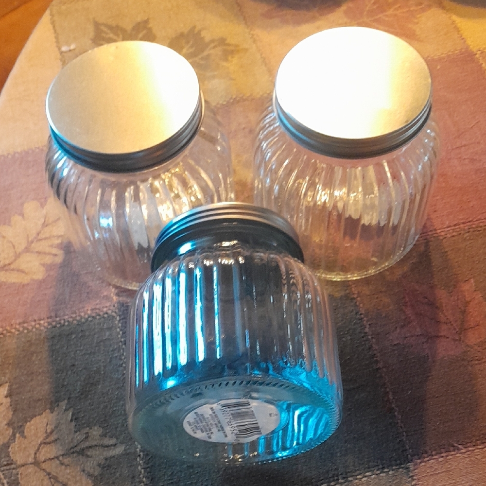 Set of Three Glass Storage Jars with Silver Lids